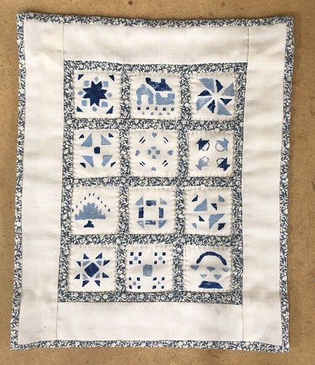 Stenciled hand-sewn quilt mc00562