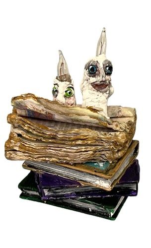 Stack of Books with Candles with Faces and That Light Up mc1346x