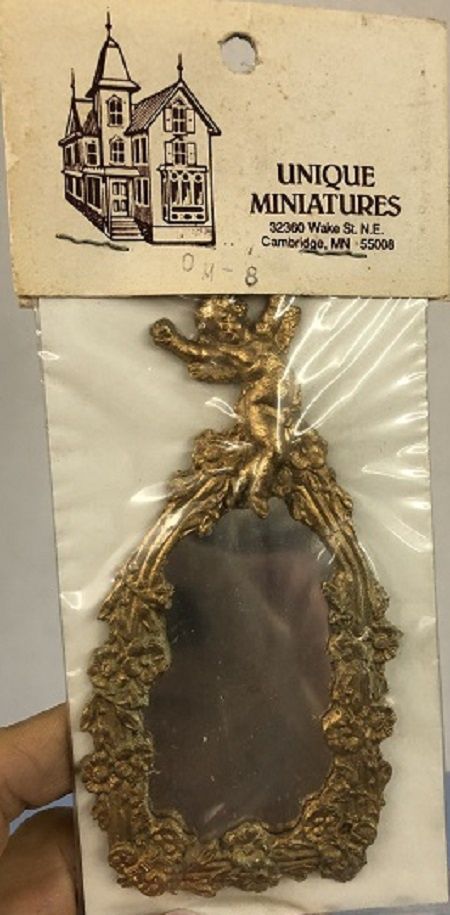 Unique Shaped Mirror with Cherub UM048