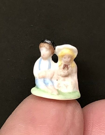Tiny Boy and Girl Figurine by Renee' Derra mc02099