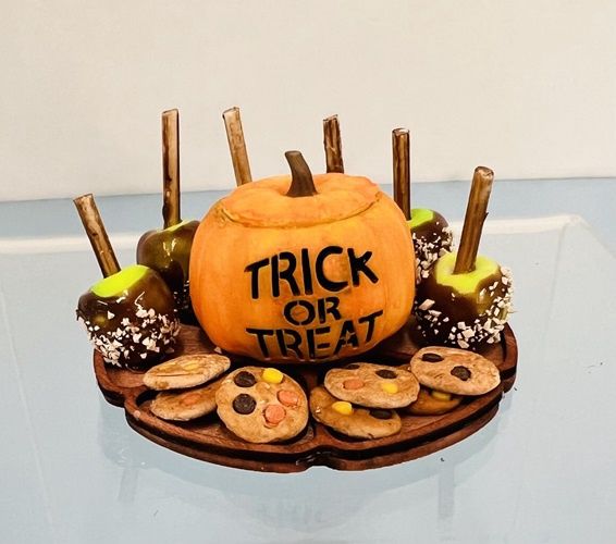 Trick or Treat Pumpkin tray with cookies and carmel apples and pumpkin jcpump