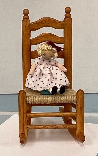 Tiny Doll in a Rocking Chair mc031266
