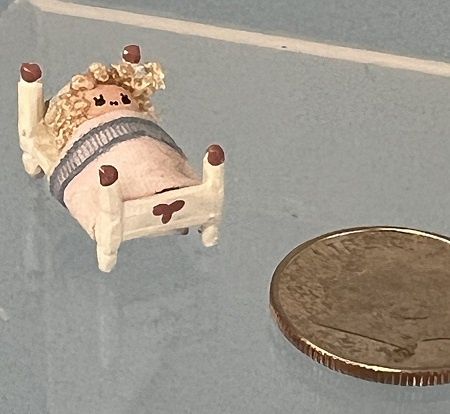Tiny Doll Tucked in Bed mc05577