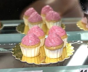Vanilla Cupcakes with Pink Icing and White Cup by Joey Casey 113220