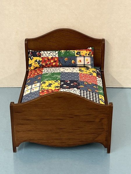 CLA10297 Walnut Bed with Quilted Bedding