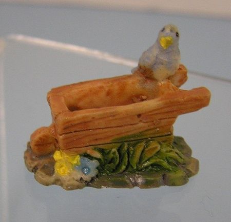 Wheelbarrow with Bird mn157