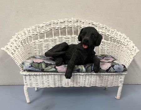 Wicker Settee with Black Lab Sitting on Cushion ch22578