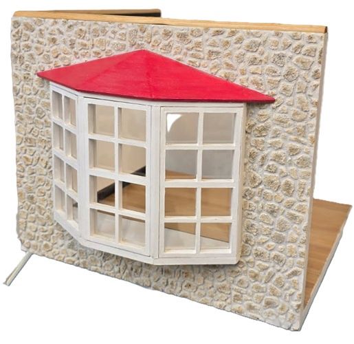 Roombox with bay window and rock wall exterior