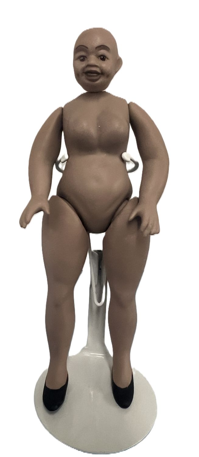 Black Lady Doll of mid tone brown porcelain