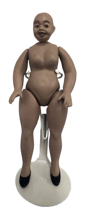 Black Lady Doll of mid tone brown porcelain