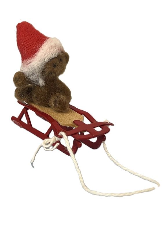 Teddy Bear on Sled with Santa Hat