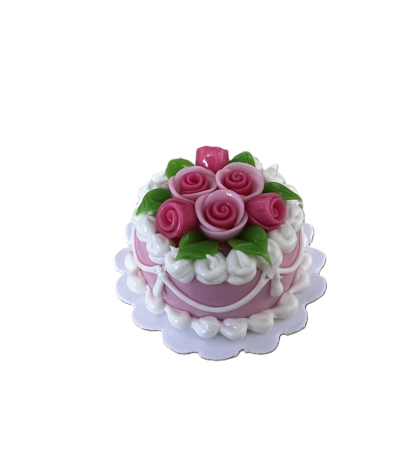 Pink cake with red and pink roses &amp; white piping