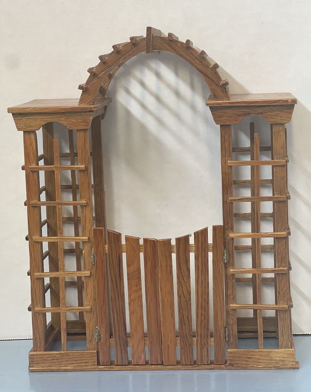 Arbor with gate in pecan