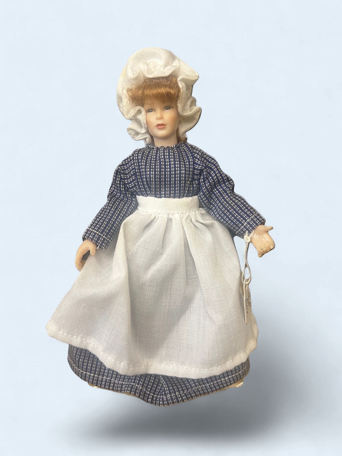 The Maid in moppet hat