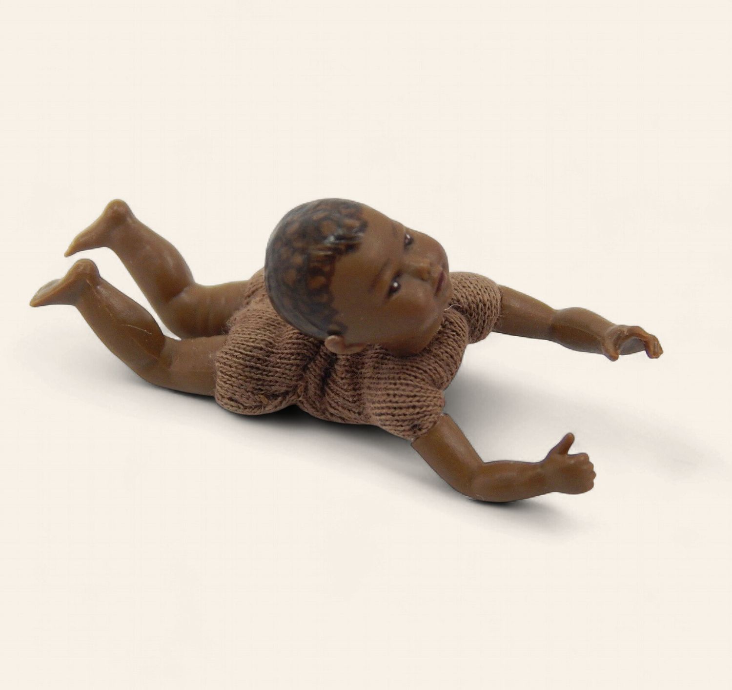 Crawling Black Baby to dress