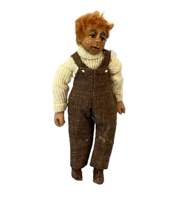 Red-Haired Boy in Overalls