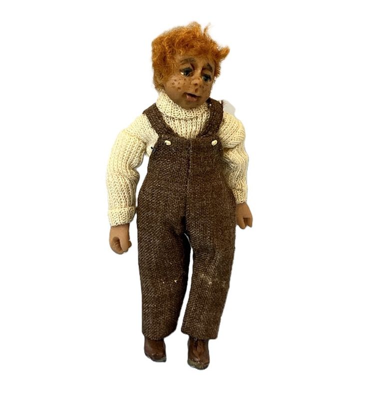 Red-Haired Boy in Overalls