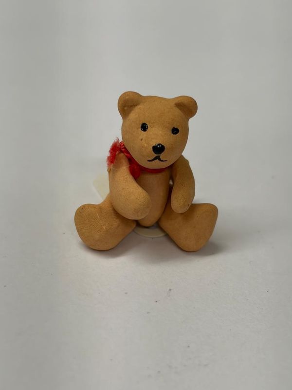 Sculpted Bear with Red Bow