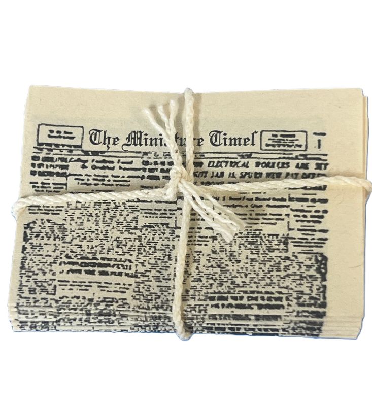 Bundle of Newspapers with The Miniature Times on top