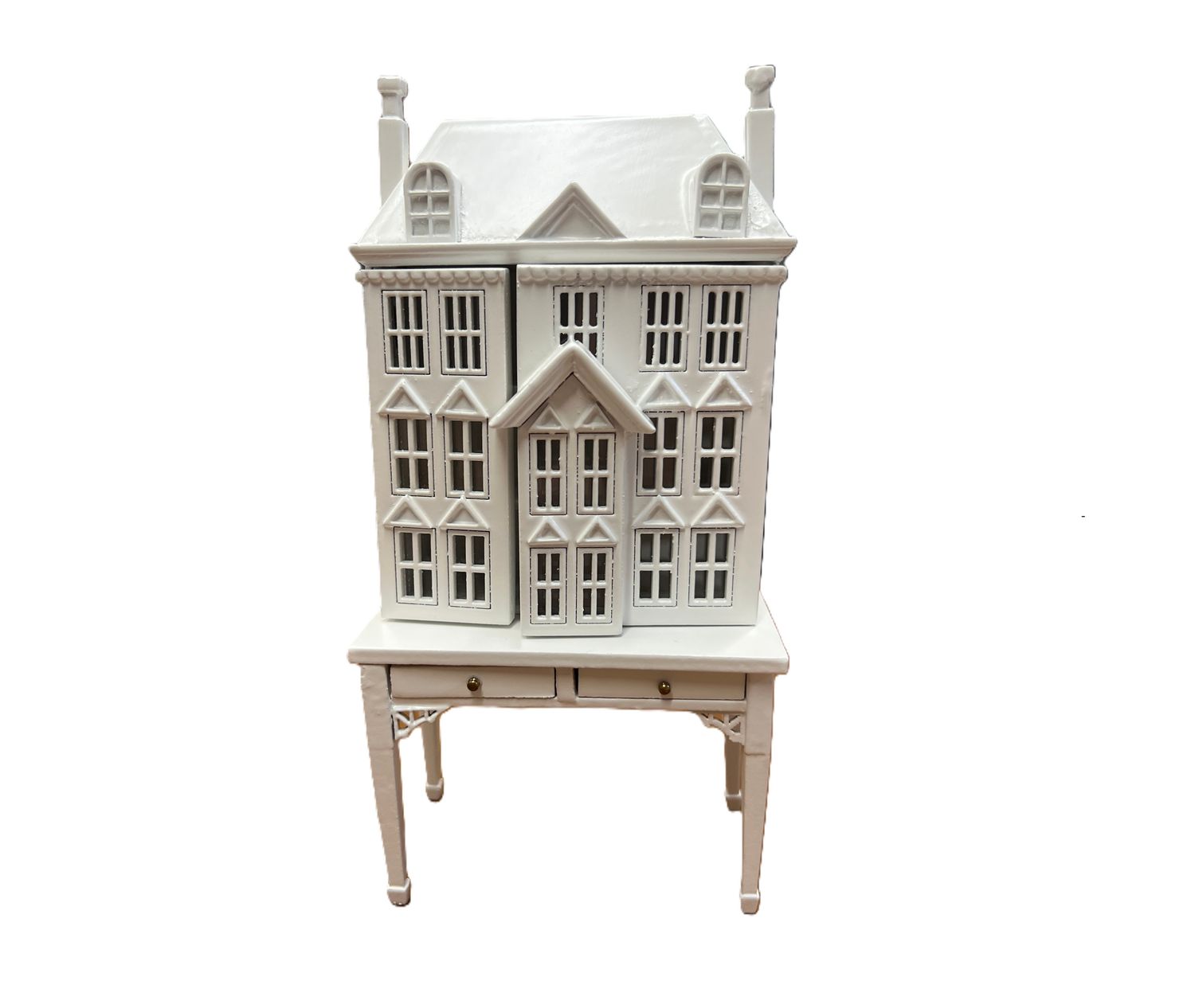 White Dollhouse on Table