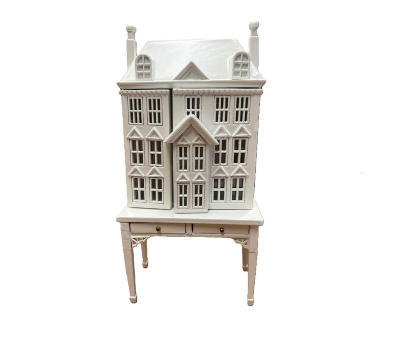 White Dollhouse on Table