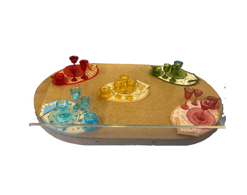 Five place setting in different colors