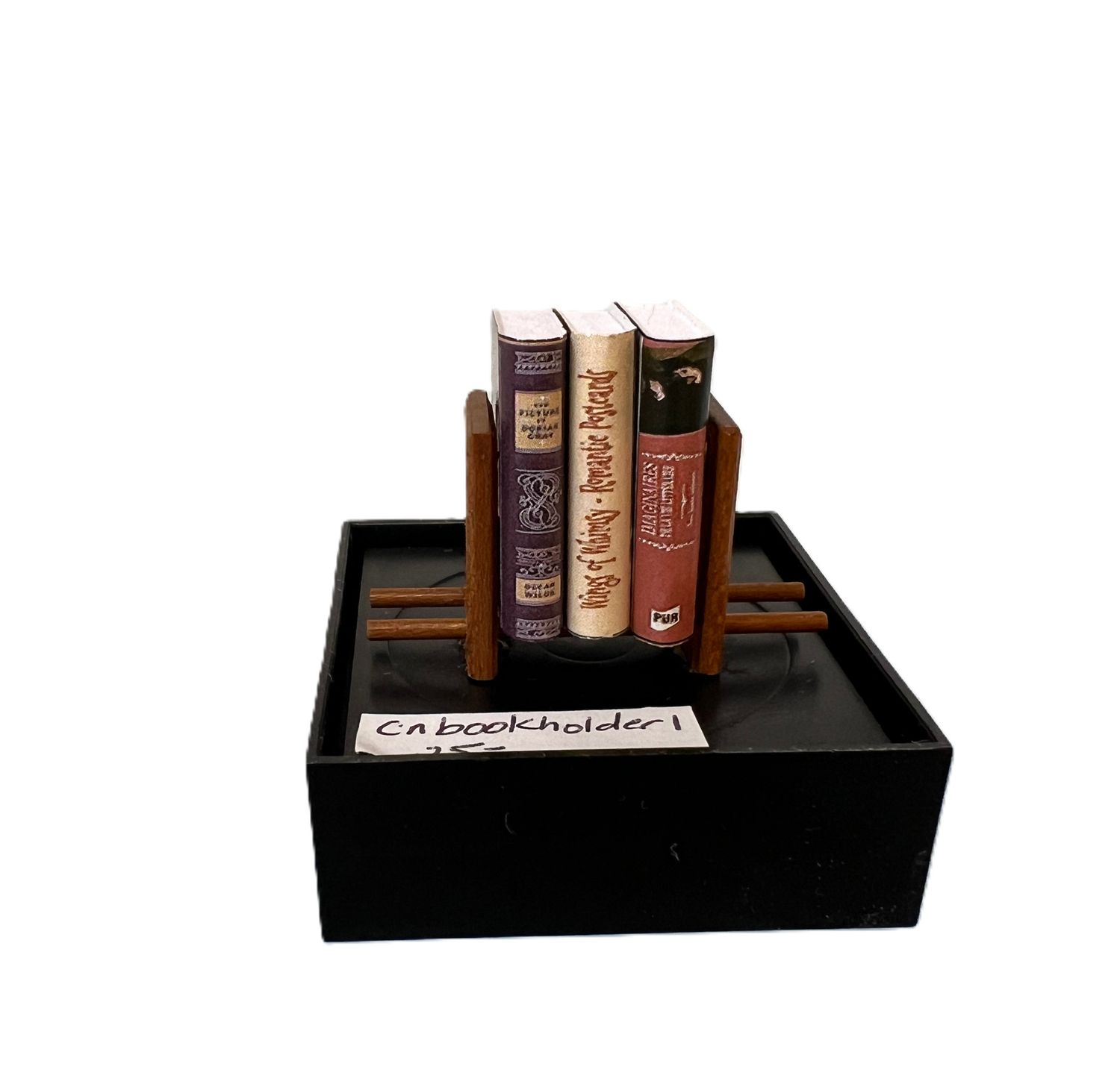 Books in Wooden Bookholder
