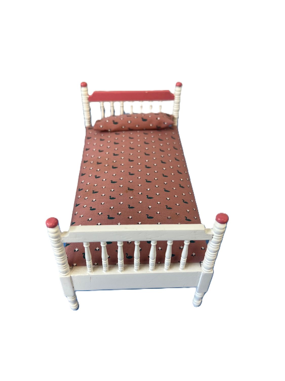White Bed with Pink Cover