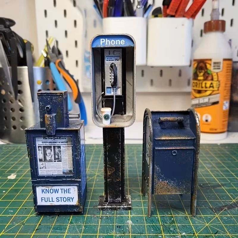 Set of four vintage machines, phone booth, paper machines, mail box