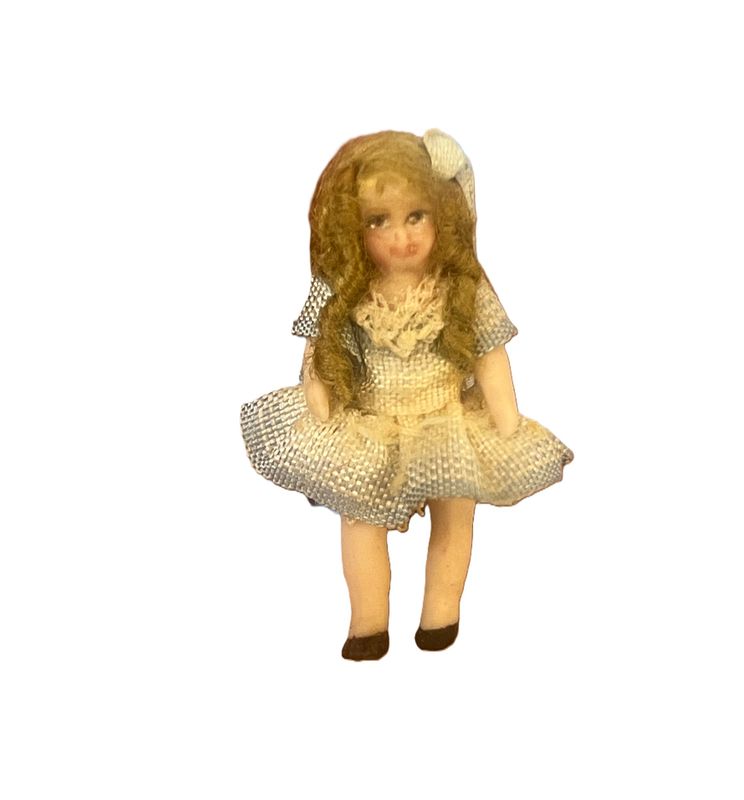 Tiny Doll in Blue and White Dress