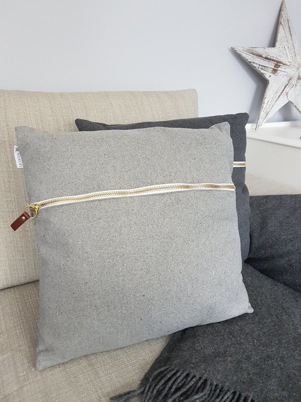 Grey zipped cushion