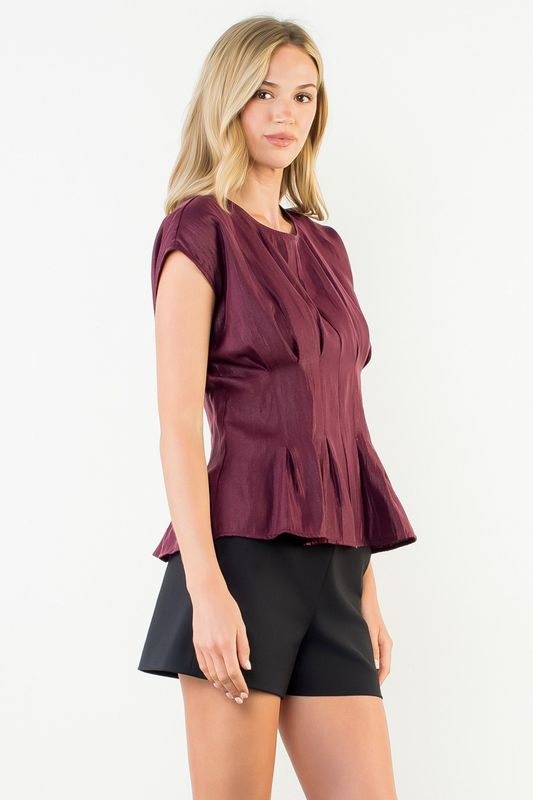 PLEATED PEPLUM SLVLESS TOP