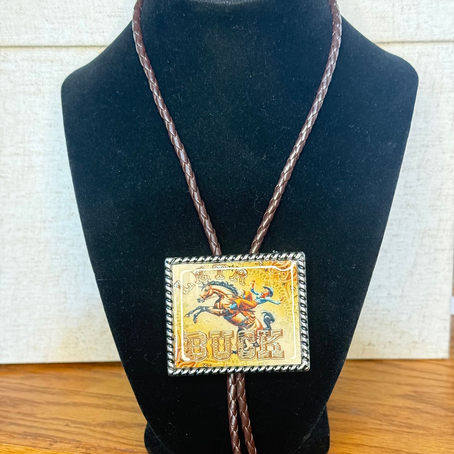 Bolo Tie "Let'r Buck"