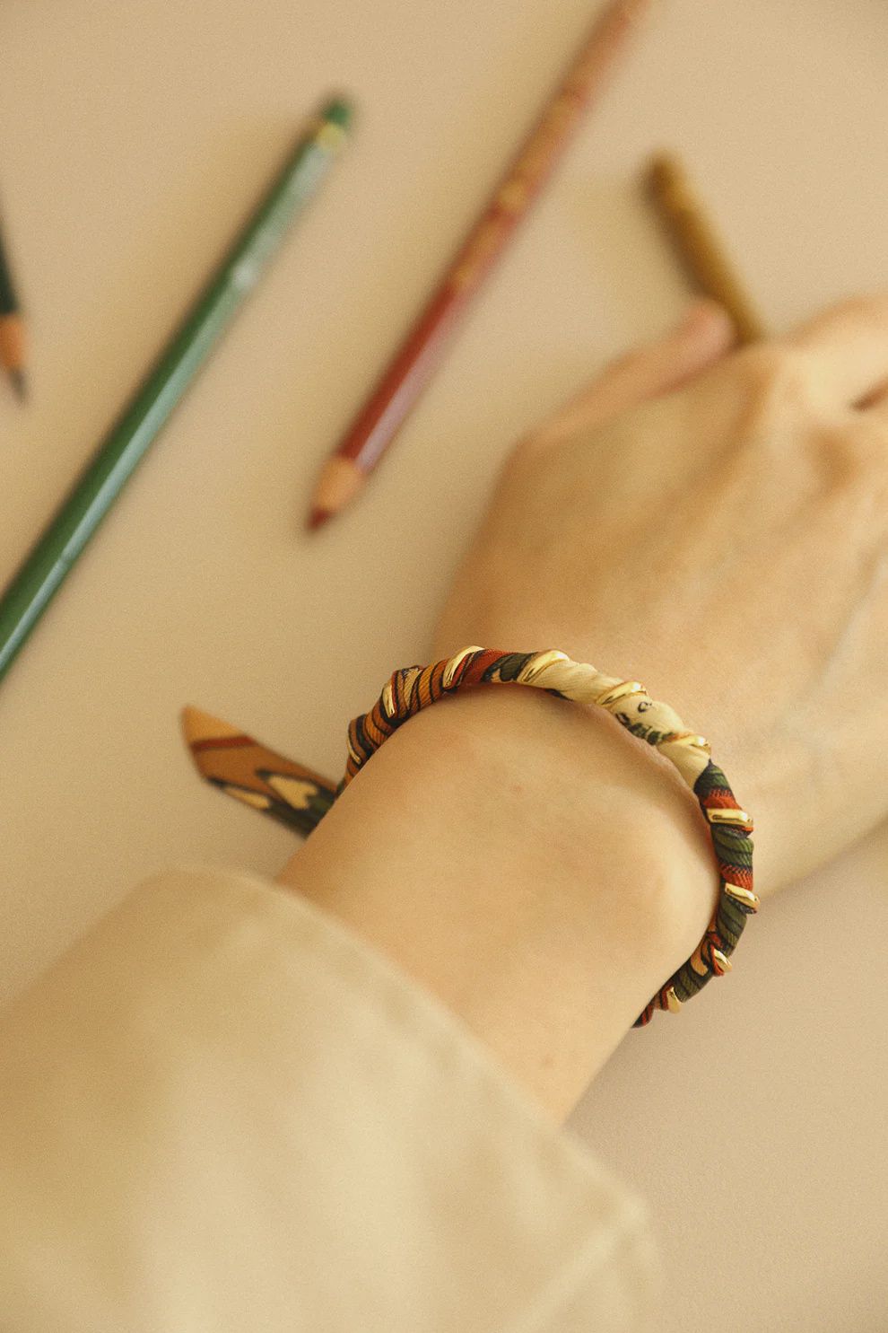 Octobre, small, gold brass