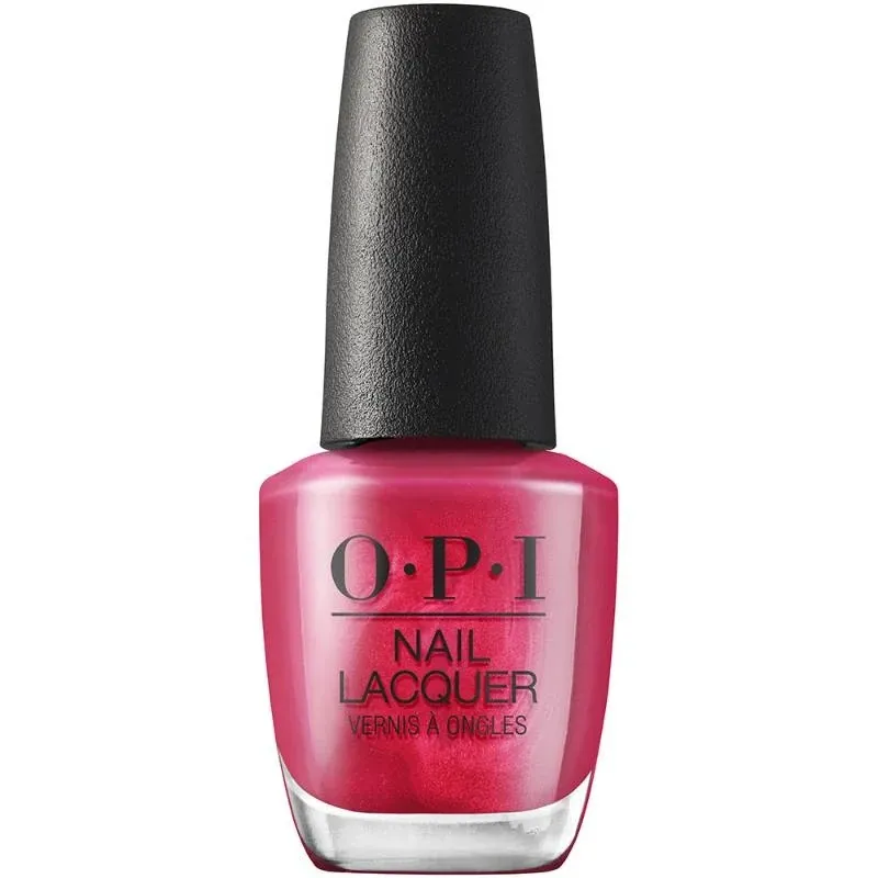 Roze nagellak met een glinsterende afwerking, genaamd 15 Minutes of Flame. Perfect voor een glamoureuze, sprankelende look.