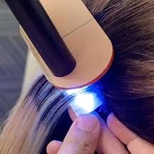 ​Tape-In Removal with UV Light