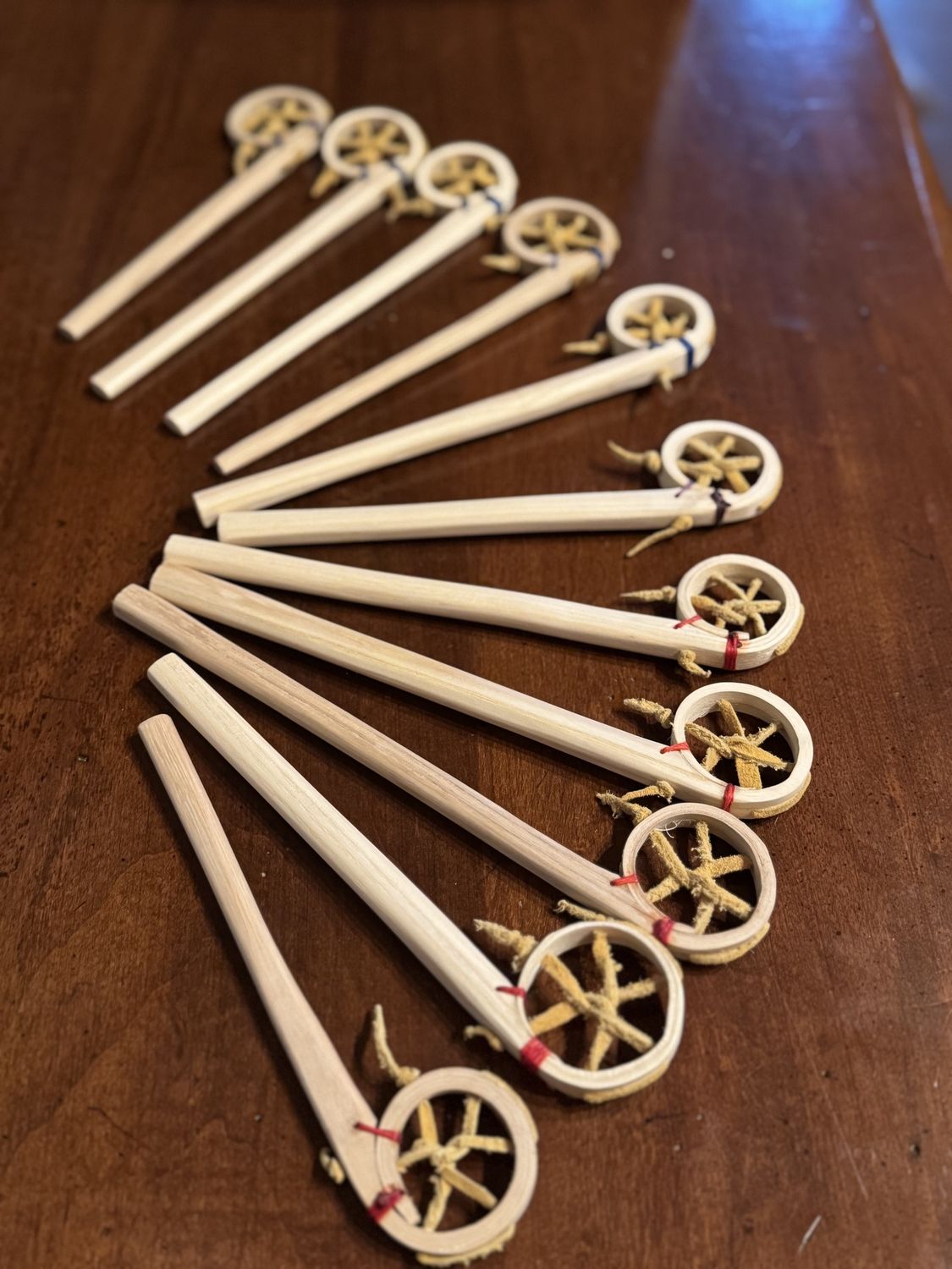 Baaga'adowaanens (mini lacrosse stick)