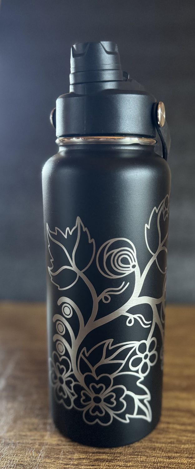 Waabigwanikaan floral water bottle, Color: Black
