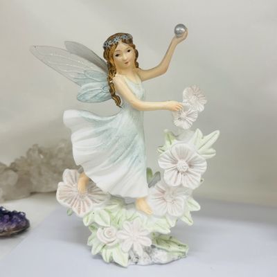 Standing Fairy holding Ball