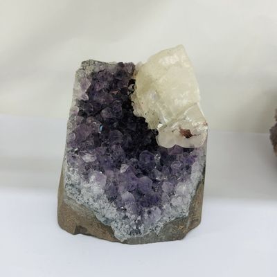 Amethyst cutbase 1.3kg with Qtz