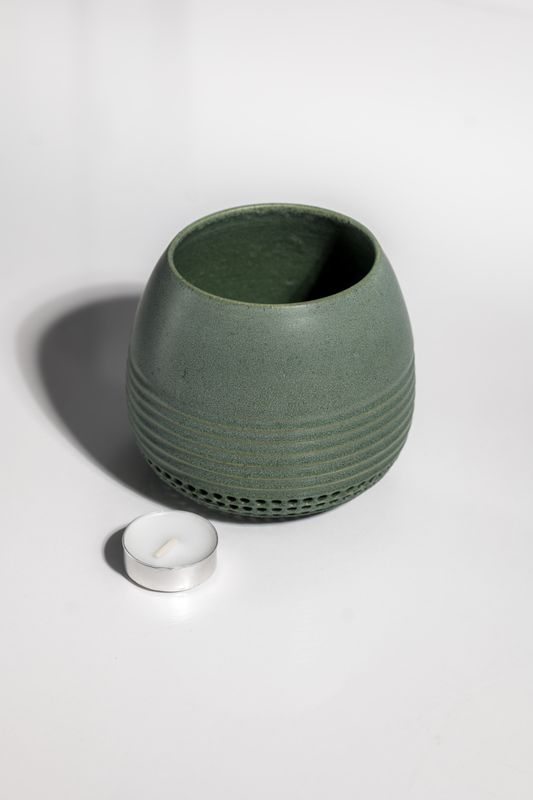 Handmade ceramic candleholder by CORTERRA Clay in matte green