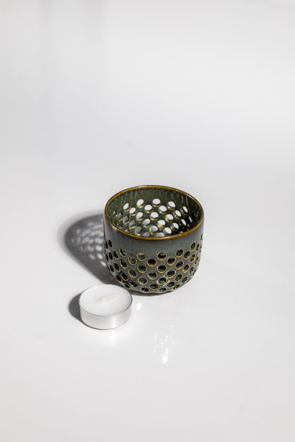 CORTERRA Clay ceramic candleholder with holes