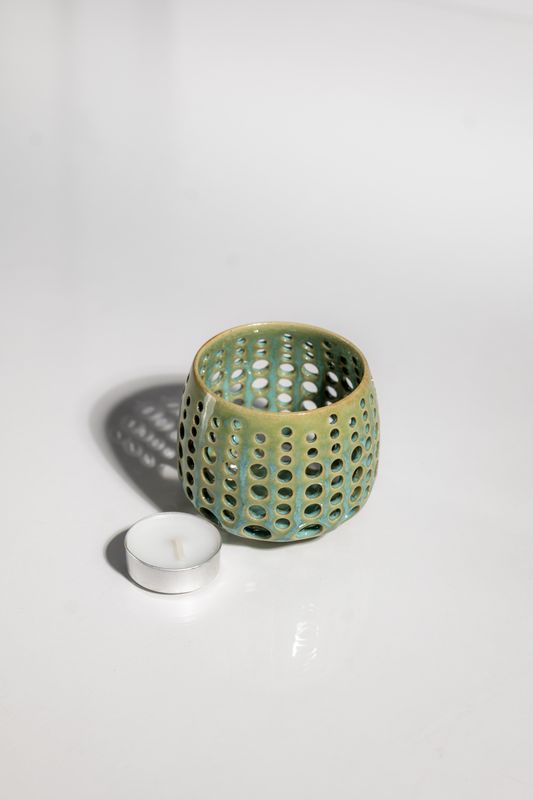 Handmade artisinal ceramic candleholder for beach cabin