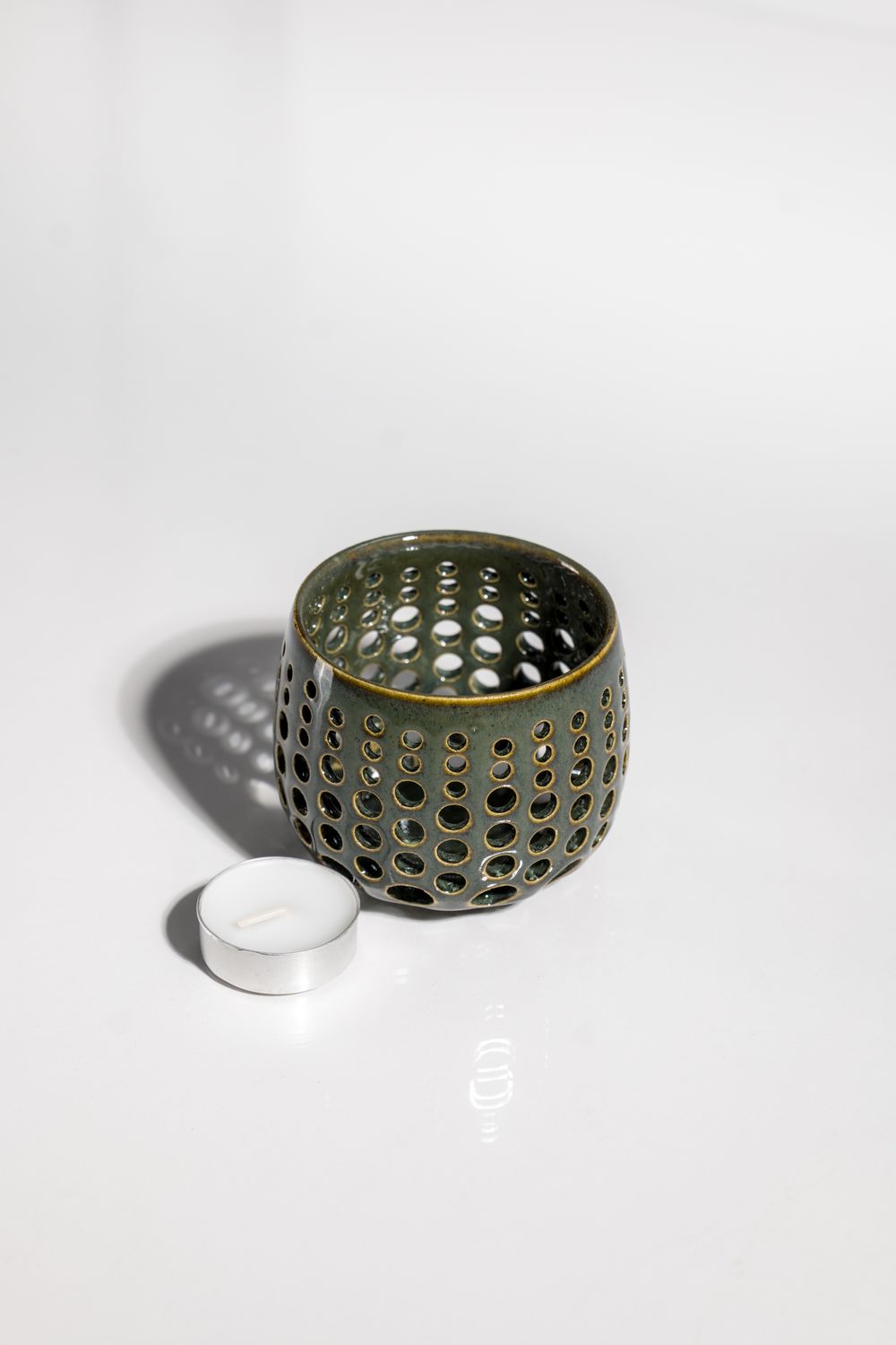 Green rustic small batch handmade candleholder for tealight candles made by CORTERRA clay in WA