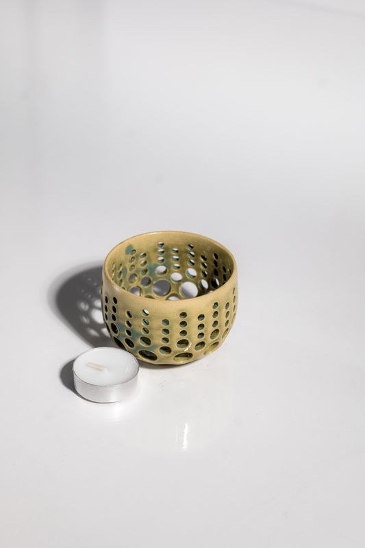 Natural ceramic votive hurricane lantern hand thrown on the pottery wheel by local artist in the CORTERRA clay ceramic studio