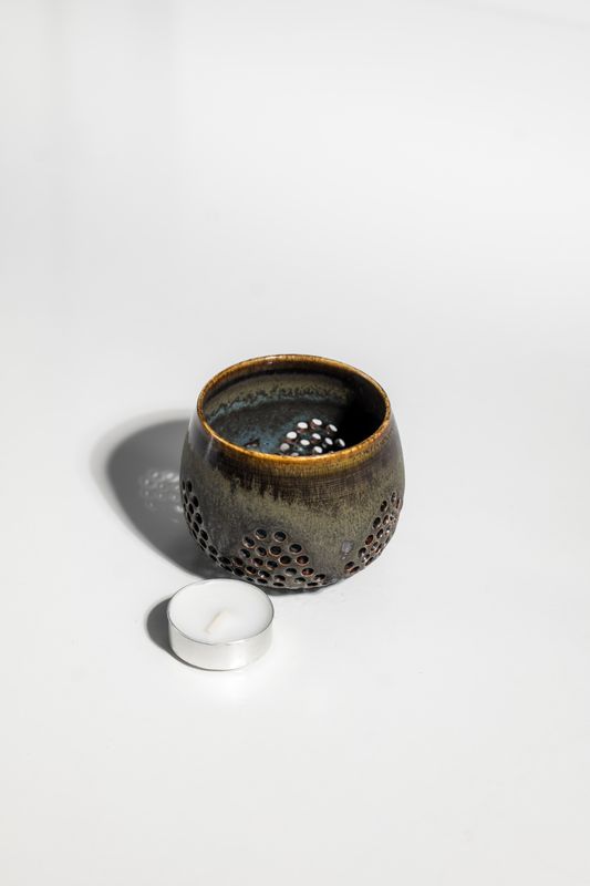 Brutalist, earthy, and organic ceramic stoneware candleholder with volcanic-inspired glaze. Handmade for tealight candles.