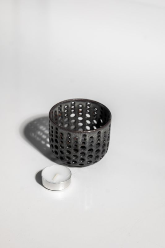 Matte black ceramic candleholder handmade in the USA by local potter at CORTERRA Clay. 
