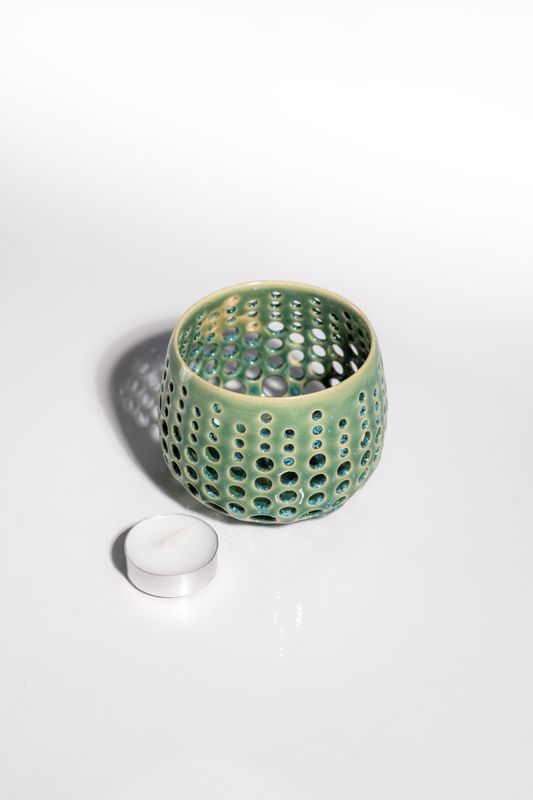 This seafoam candle holder fits perfectly in the windowsill of a seaside cottage. Handmade and inspired by the ocean. 