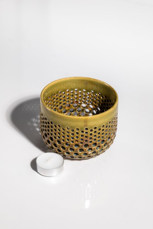 CORTERRA CLAY tealight candleholder designed to cast beautiful patterns and shapes on nearby surfaces made in the USA