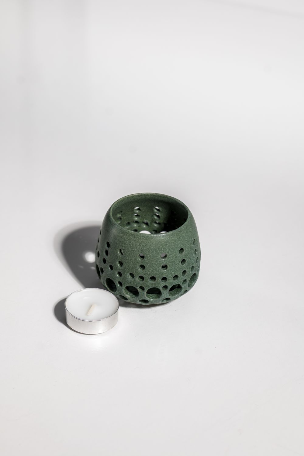 Dark green matte ceramic tealight candleholder by CORTERRA clay in united state. 